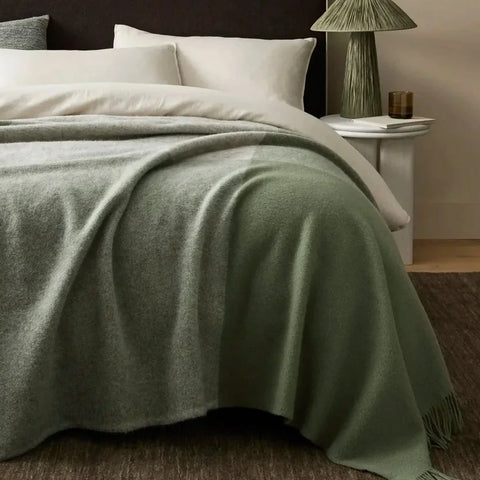 Extra large throw blanket suitable for a bed
