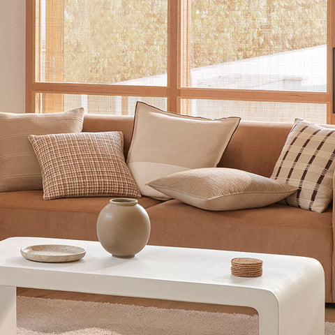 Warm-toned new season cushions for Summer 25