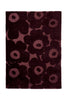 Marimekko Unikko floral patterned rug with deep burgundy flowers at varying pile heights