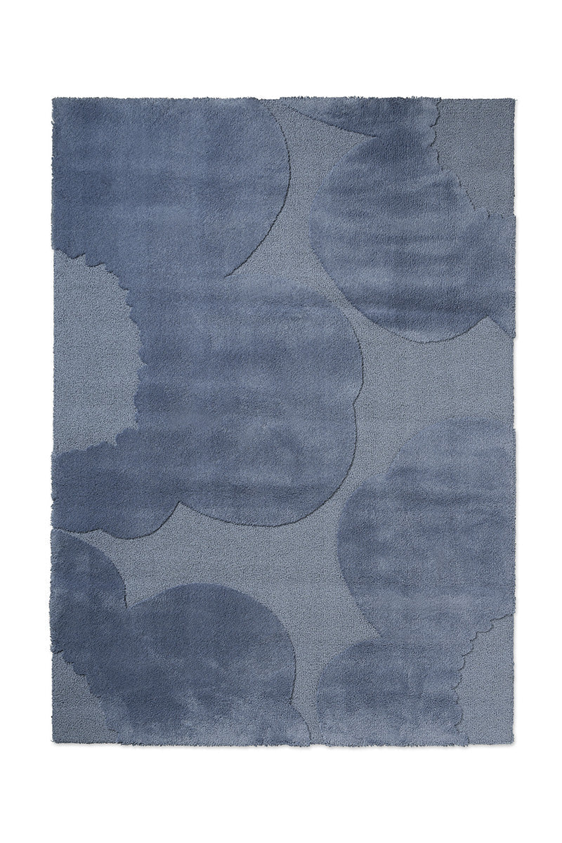 Marimekko Unikko floral patterned rug with mid blue flowers at varying pile heights