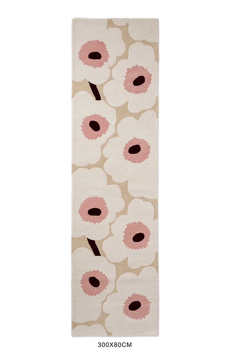 Marimekko hallway runner rug in NZ wool with white and pink unikko design on a beige background