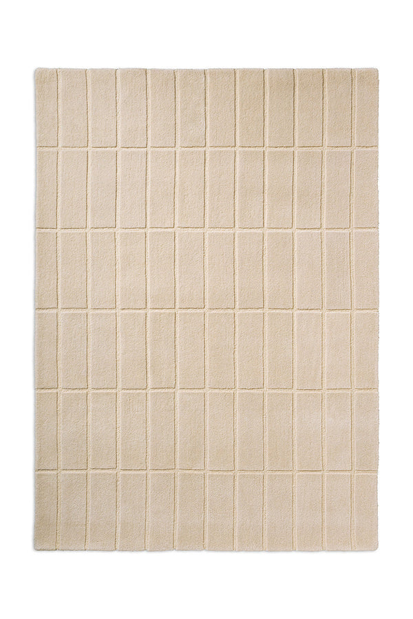 A Marimekko grid patterned rug in NZ wool and in a neutral creamy white