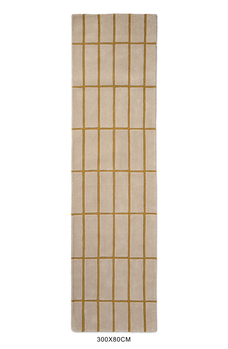 Marimekko NZ wool beige runner rug with gold grid pattern seen from above