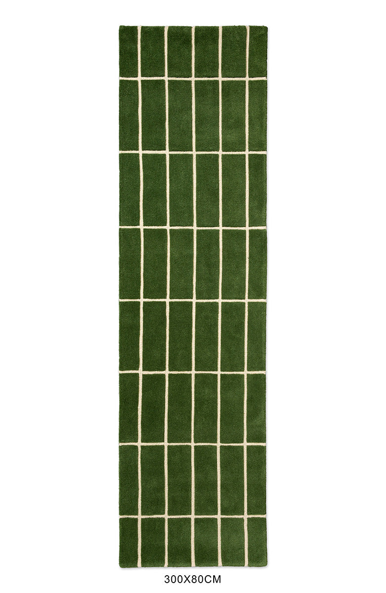 View from above of a green geometric Marimekko NZ wool runner rug 