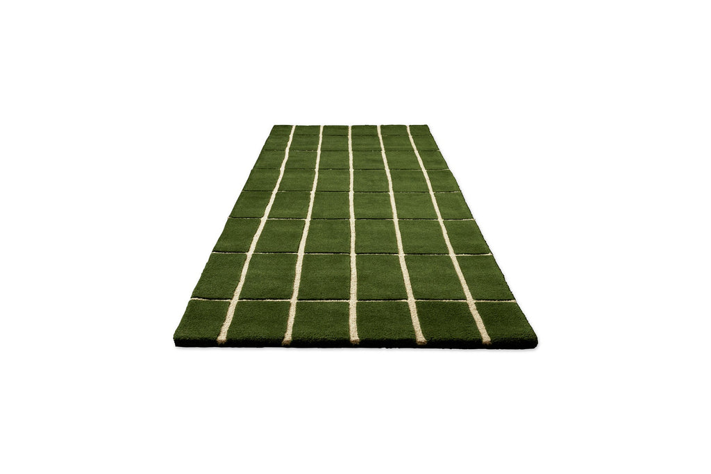 Persepctive view of a green geometric Marimekko NZ wool runner rug 