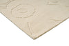 Corner close up of a creamy white Marimekko NZ wool rug with a subtle floral unikko graphic