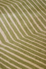 Close-up of a Marimekko green and beige geometric NZ wool rug