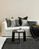 Modern living room setting with neutral black and grey cushions by Baya