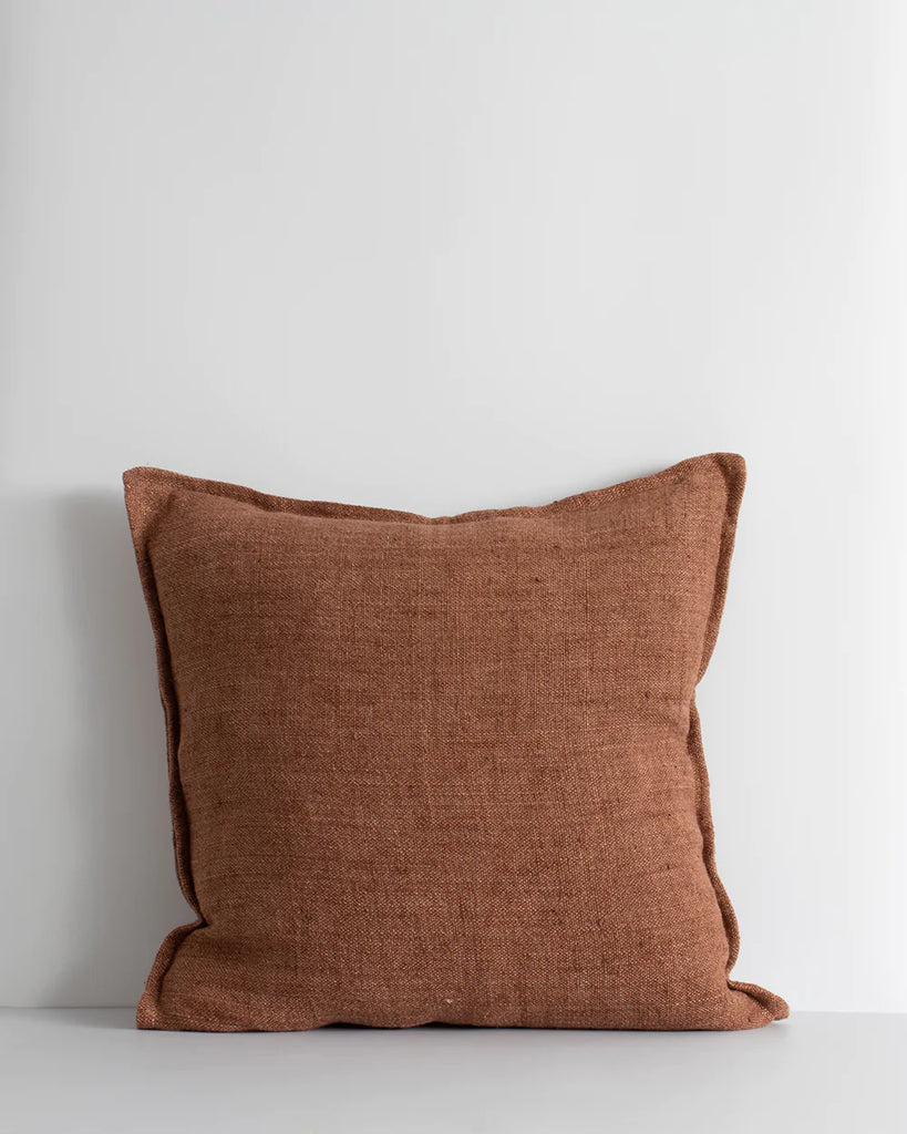 A textural linen cushion in a beautiful brown colour called chutney