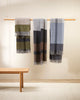 Three Baya nz wool Brunswick throws draped over a rail to show the softness and nature-inspired colours