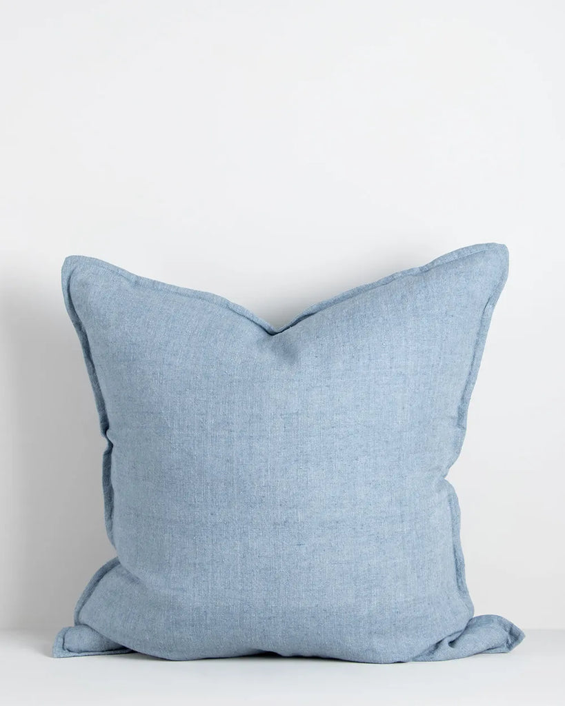 Baya plain linen cushion in a chambray blue colour