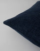 Close up of the textural weave of the Baya Cyprian cushion in colour midnight
