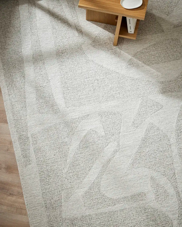 The Baya patterned wool floor rug 'Maya'  in a modern living room