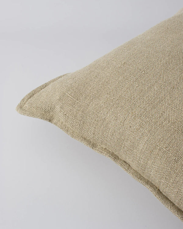 Close up of the textural weave and flange edge of the Baya Flaxmill cushion in colour 'Doeskin' 