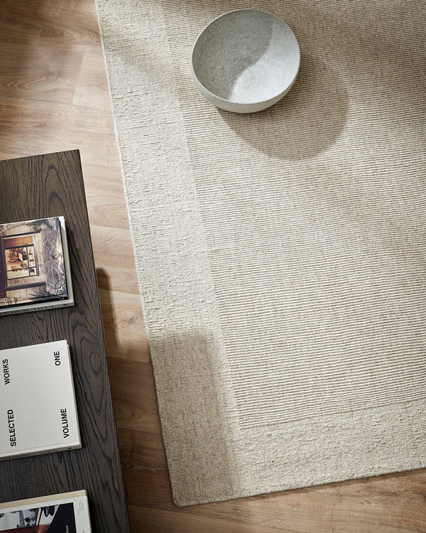 The Baya wool rug 'Vermont' in colour 'Sand, seen in a contemporary living room