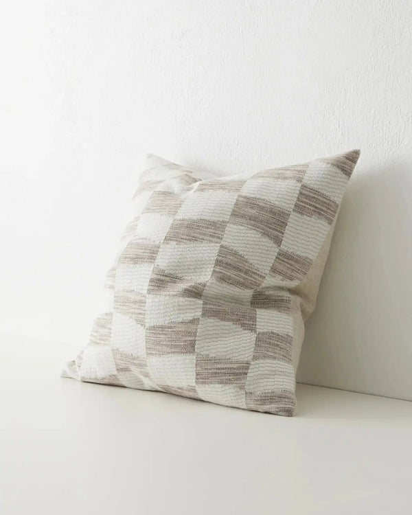 White and beige geometric cushion in a check pattern, by Weave Home nz