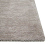 Corner of the Bower Circle grey wool blend floor rug featuring a circular pattern design, by Globe West and Soren Liv nz