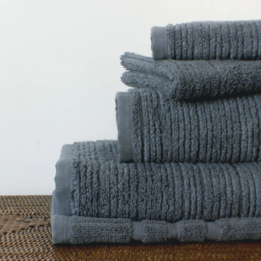 Stack of ink blue Chelsea superior quality bath towel range