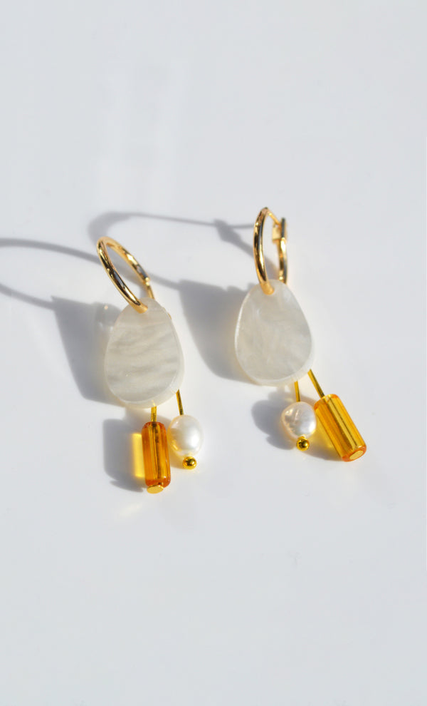 NZ designer Hagen and Co dangle earrings feathring acrylic, glass beads, and a freshwater pearl charm