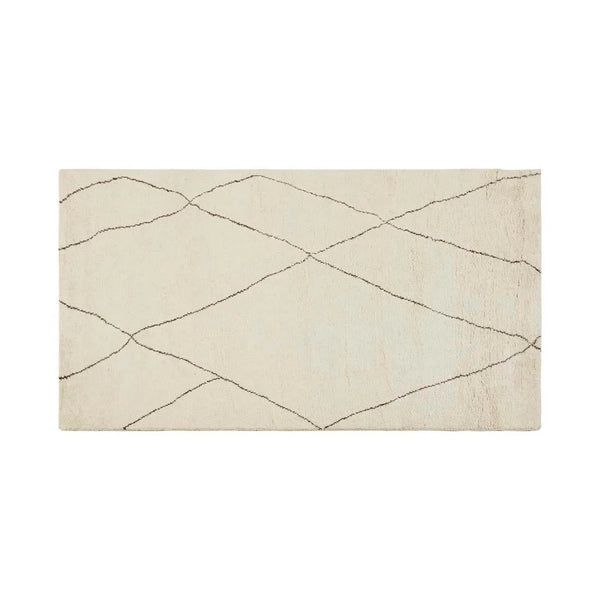 Full view of the Globe West/Soren Liv Bower Linear rug with diamond details