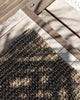 A close up of the Broome doormat, the textural dark woven jute fibres adding interest to the entranceway. 
