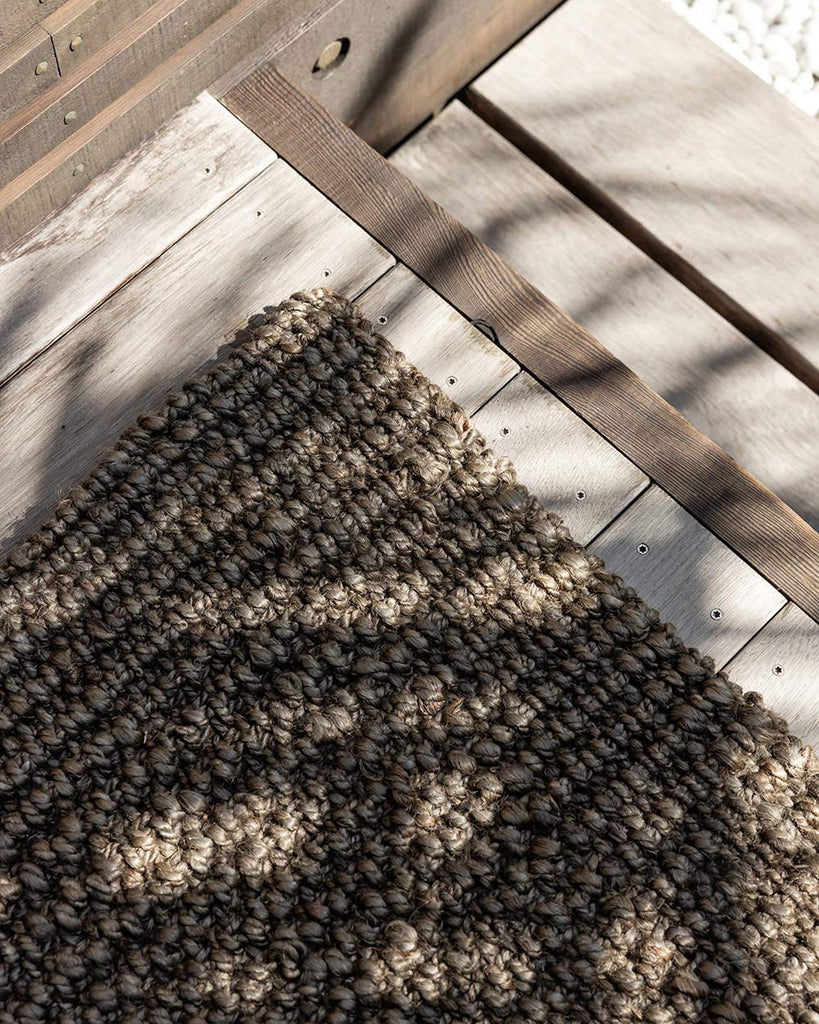 A close up of the Broome doormat, the textural dark woven jute fibres adding interest to the entranceway. 