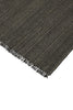 The 'Puglia' floor rug by Weave Home, in colour 'Pigeon" - a deep cool-toned brown, with a short fringe edge detail