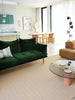 The Tribe Home Fritz floor rug in colour Sand/Pink shown in a contemporary living room