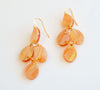 Statement earrings inspired by Parisian elegant chandeliers in a gorgeous peach swirl acrylic.