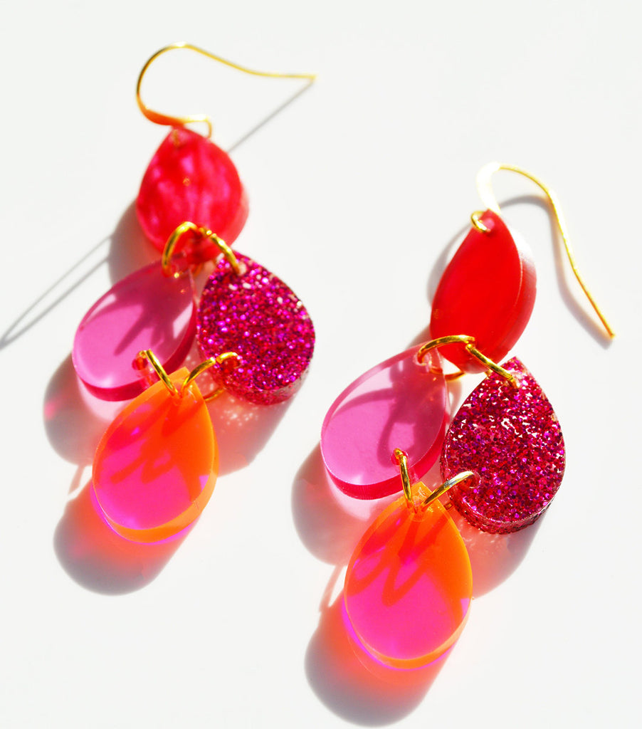 Pink dangle earrings by Hagen + Co