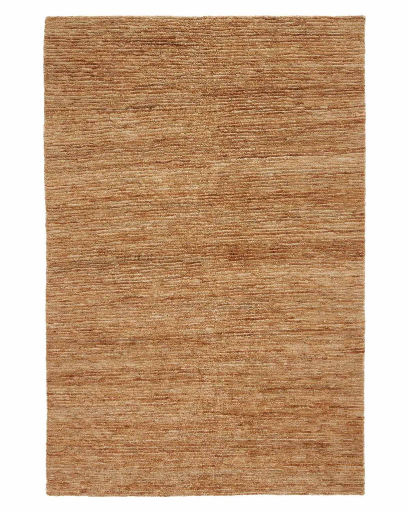 A full image of a textured brown jute fibre floor rug. 