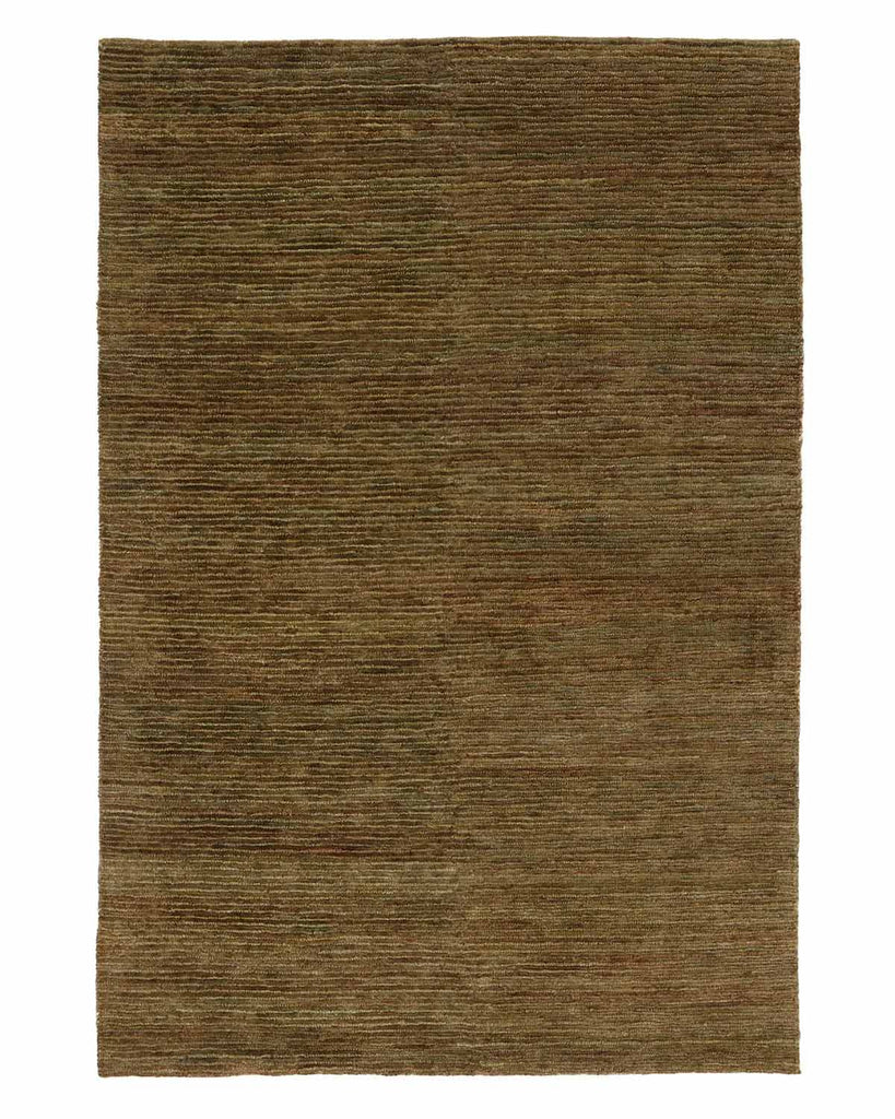 A full image of a textured cut/looped jute floor rug in deep warm green tones.