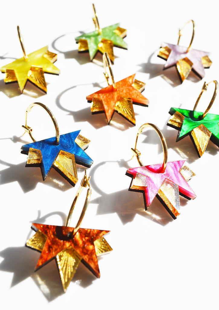 The full range colours  of acrylic star earrings on gold hoops by Hagen + Co