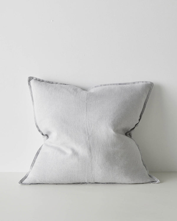 A square cushion in a soft dove grey, made with European linen with a central seam and flange edging. 