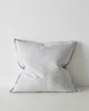 A square cushion in a soft dove grey, made with European linen with a central seam and flange edging. 