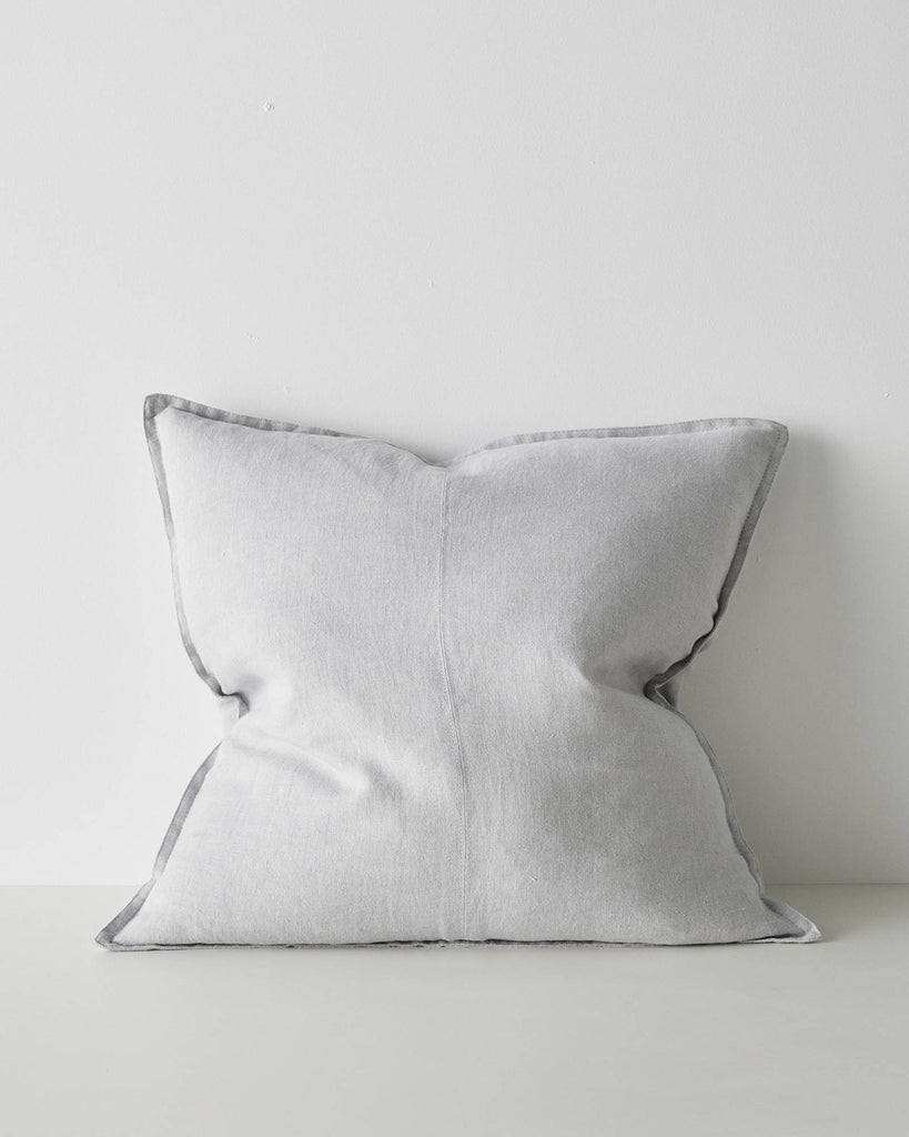A square cushion in a soft dove grey, made with European linen with a central seam and flange edging. 
