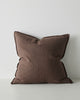 A large, Euro style cushion made of soft linen in a warm deep brown tone, with flanged edging. 