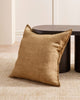 A soft yellow brown cushion, in textured linen with a soft flange edge, by Baya. 