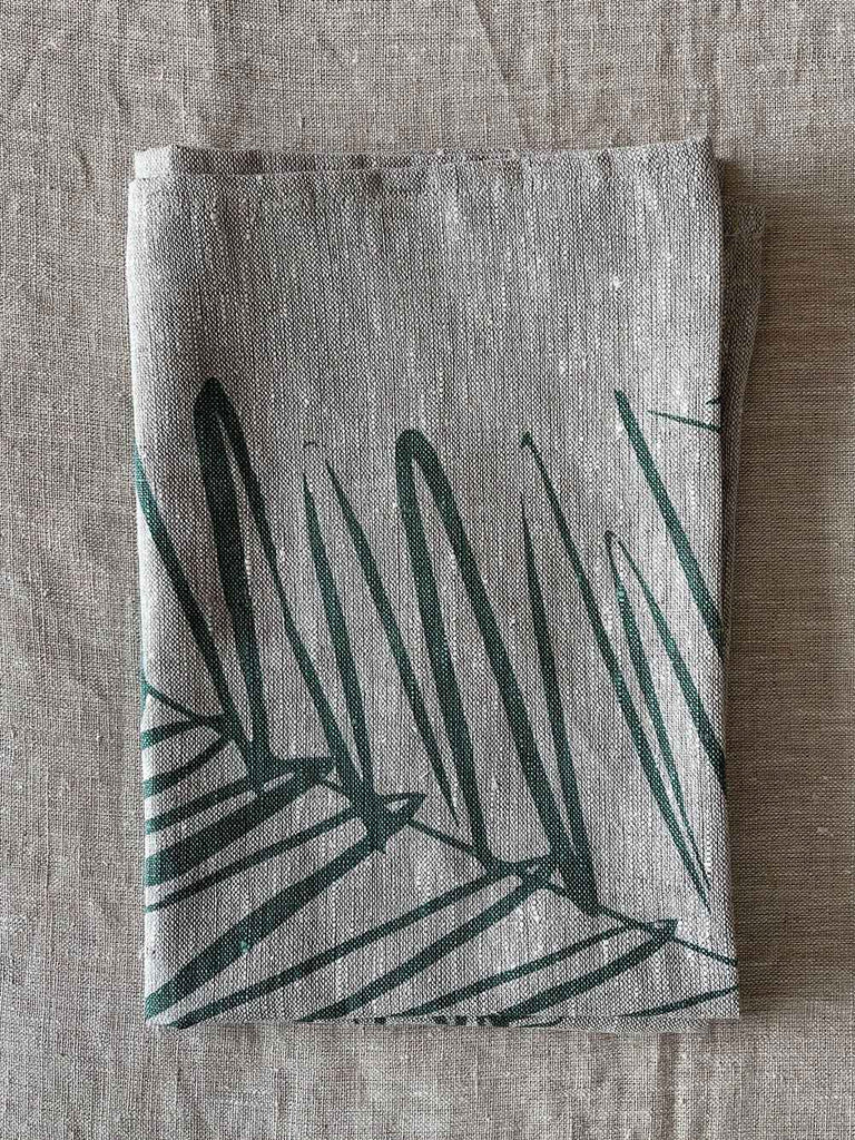 Folded, handprinted linen tea towel 'Leaf Sage Green' by Smitten Design nz