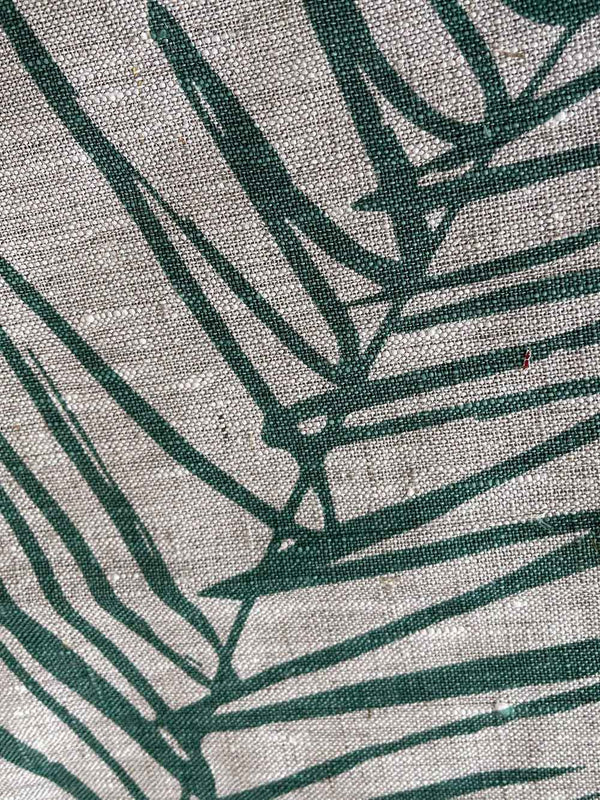 Close up of the handprinted linen tea towel 'Leaf Sage Green' by Smitten Design nz