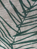 Close up of the handprinted linen tea towel 'Leaf Sage Green' by Smitten Design nz