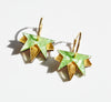 Close up of the Lucky Star acrylic earrings in mint green and gold, by Hagen and Co