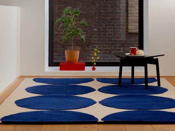 Marimekko Isot Kivet blue wool rug seen in a contemporary space