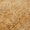 Close up view of the weave of a warm, light honey mustard brown wool blend rug by Globe West and Soren Liv NZ