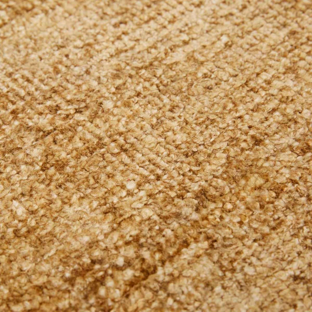 Close up view of the weave of a warm, light honey mustard brown wool blend rug by Globe West and Soren Liv NZ