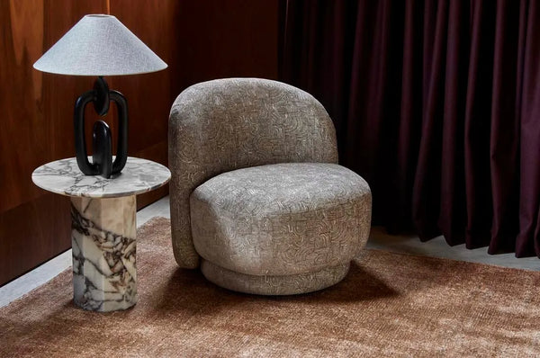 A warm brown wool blend floor rug seen in a contemporary home