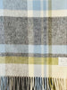 Blue, green, cream and grey NZ wool throw blanket by Exquisite Wool Traders, seen close up