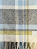 Blue, green, cream and grey NZ wool throw blanket by Exquisite Wool Traders, seen close up