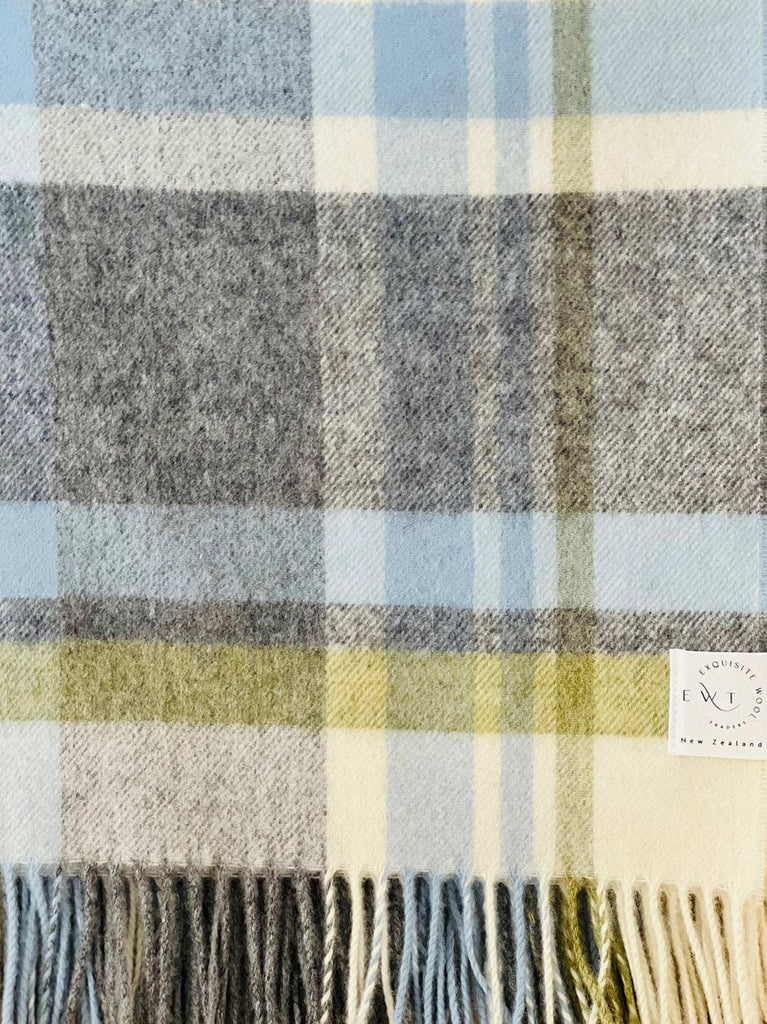 Blue, green, cream and grey NZ wool throw blanket by Exquisite Wool Traders, seen close up