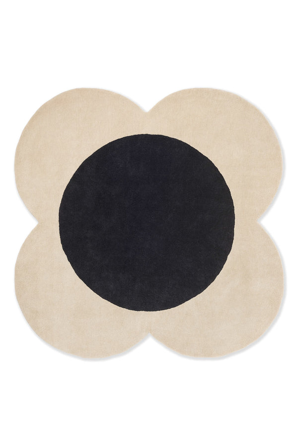 The Orla Kiely Spot Flower Rug in black and ecru seen from above